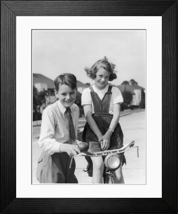 Framed Print : Boy & Girl with Bicycle Framed Print : Boy & Girl with Bicycle