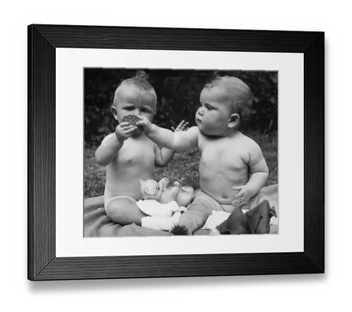 Framed Print : Babies with Biscuit Framed Print : Babies with Biscuit