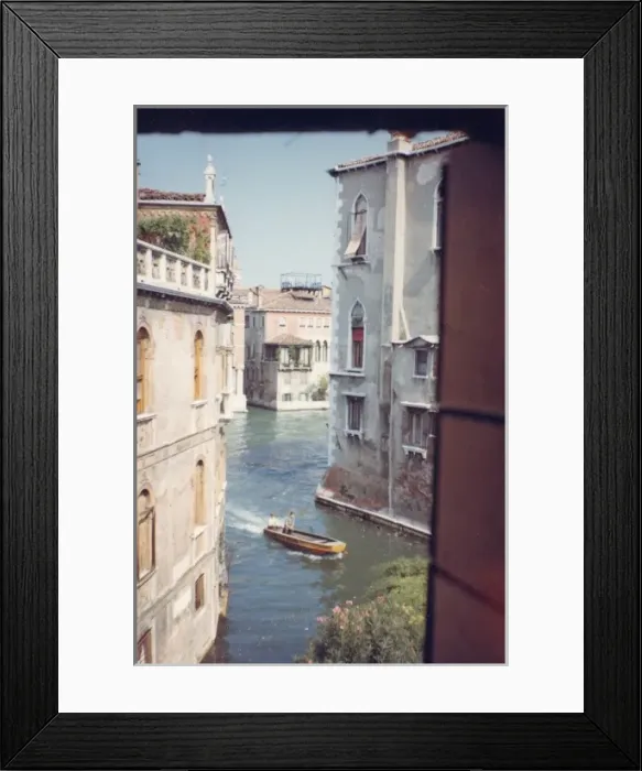 Framed Print : View of a canal through a window, Venice, Italy Framed Print : View of a canal through a window, Venice, Italy