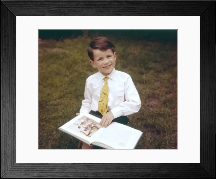 Framed Print : Boy Reading Book Framed Print : Boy Reading Book
