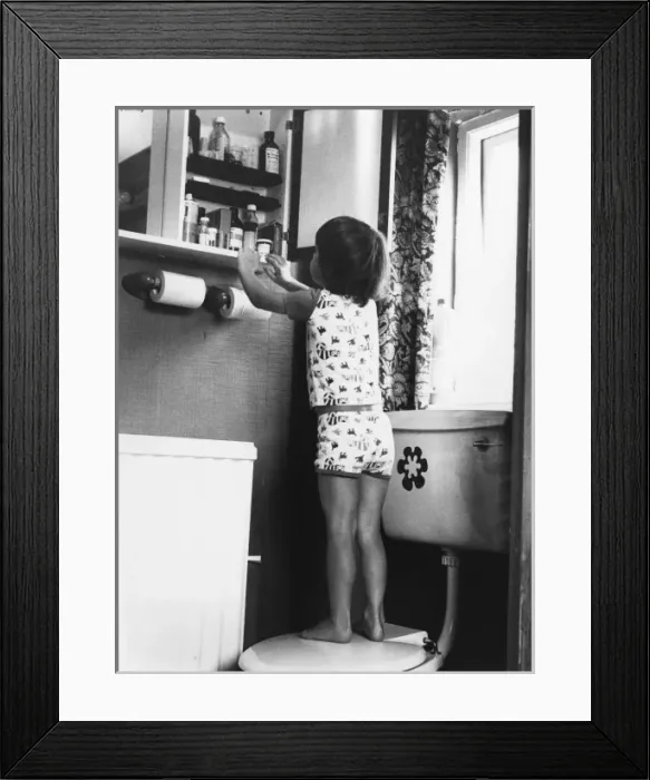 Framed Print : Girl & Bathroom Cabinet Framed Print : Girl & Bathroom Cabinet