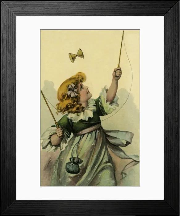 Framed Print : Little girl playing with her diabolo Framed Print : Little girl playing with her diabolo