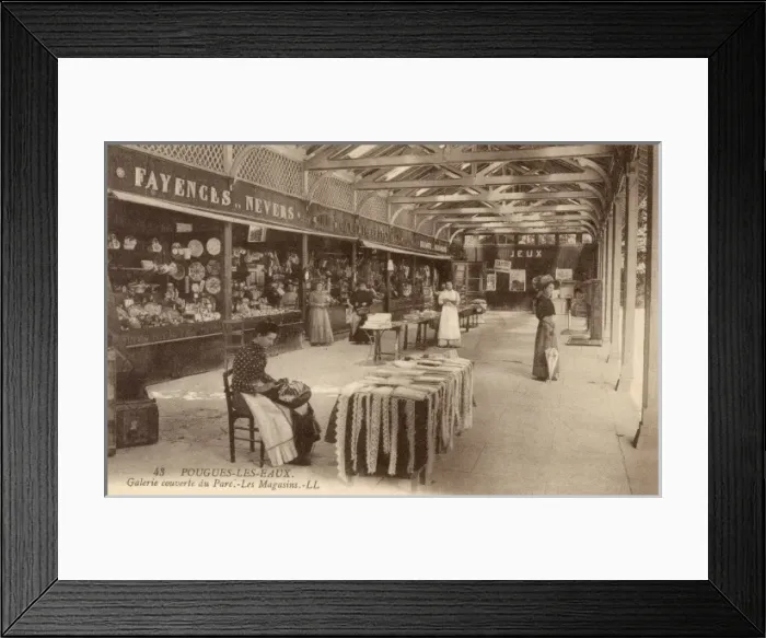 Framed Print : Pouges-Les-Eaux - Shops in the Covered Gallery Framed Print : Pouges-Les-Eaux - Shops in the Covered Gallery