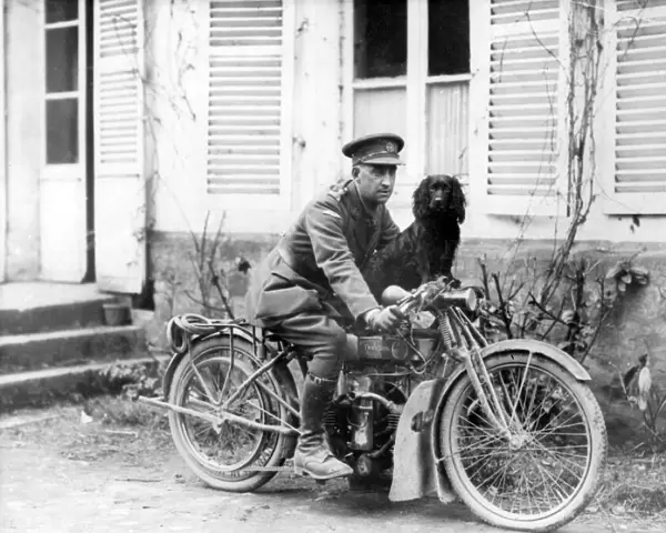 Officer of Tank Corps with dog and motorbike, France, WW1