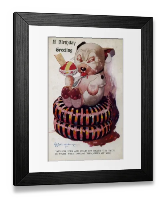 Framed Print : Bonzo on a cushion eating ice-cream Framed Print : Bonzo on a cushion eating ice-cream