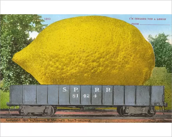 Rail car transporting a giant lemon