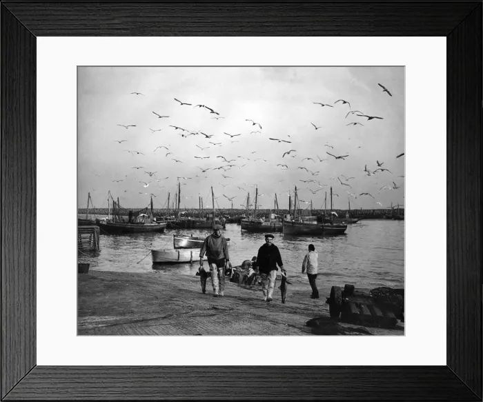 Framed Print : Fishermen and boats in a harbour Framed Print : Fishermen and boats in a harbour