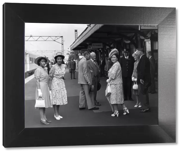 King George VI and family on railway platform