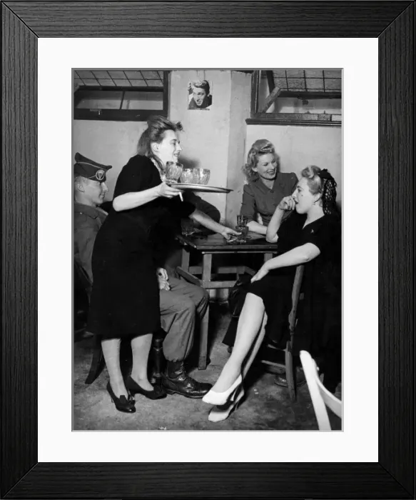 Framed Print : Girls entertaining American GI in London bar Framed Print : Girls entertaining American GI in London bar