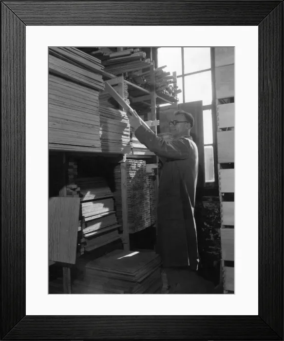 Framed Print : Selecting timber at a cabinet makers, Shoreditch, London