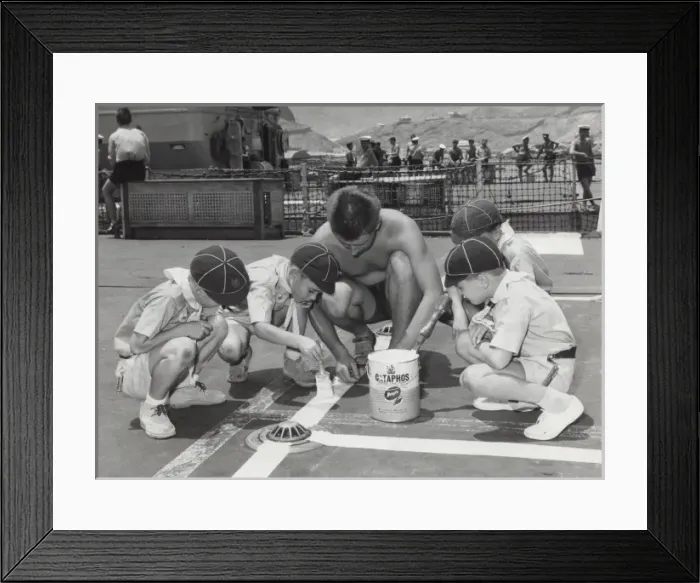 Framed Print : Cubs painting lines on ship Framed Print : Cubs painting lines on ship