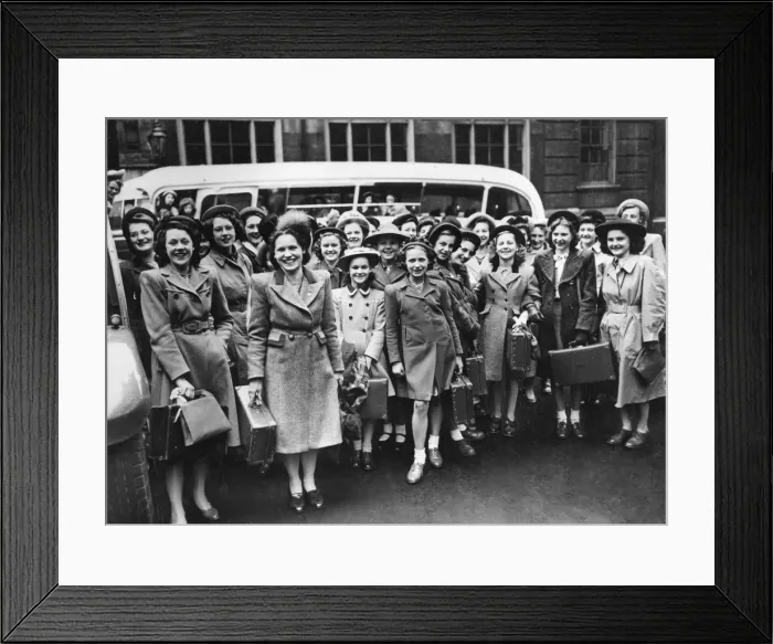 Framed Print : Group of women in front of a coach Framed Print : Group of women in front of a coach