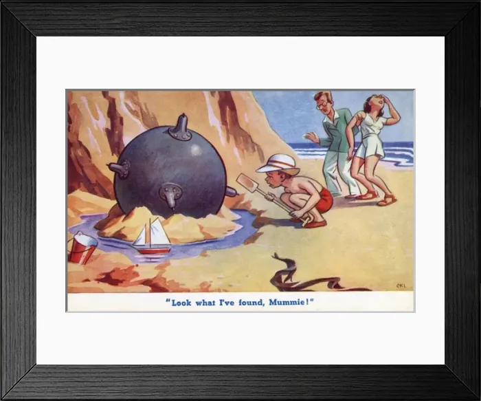 Framed Print : Boy on beach with Sea Mine Framed Print : Boy on beach with Sea Mine