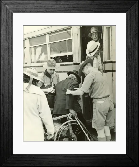 Framed Print : Scouts helping elderly man Framed Print : Scouts helping elderly man