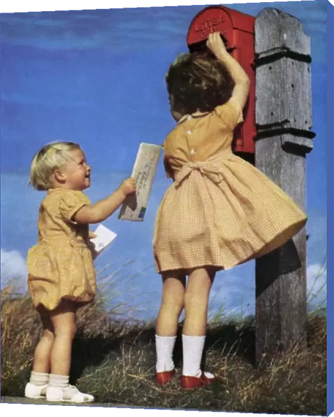 Children posting a letter