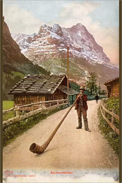 Blowing an Alpenhorn, Switzerland