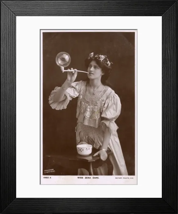 Framed Print : Miss Zena Dare blowing a large bubble Framed Print : Miss Zena Dare blowing a large bubble