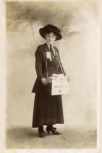 Suffragette selling badges