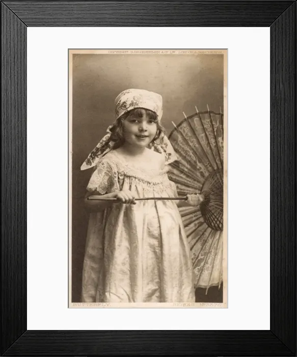 Framed Print : Smiling young girl with a parasol Framed Print : Smiling young girl with a parasol