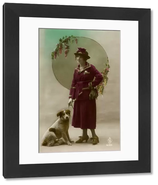 Young woman in purple costume, with dog