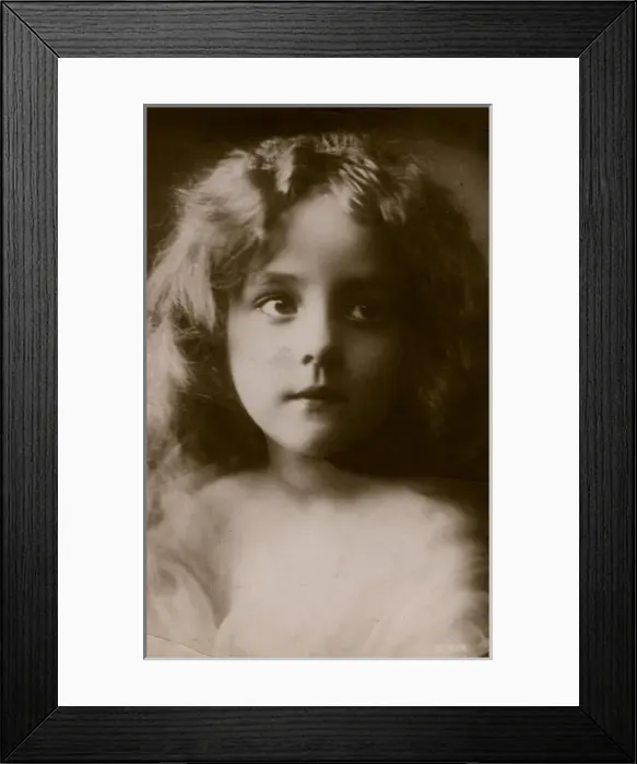 Framed Print : Little girl with dreamy look Framed Print : Little girl with dreamy look