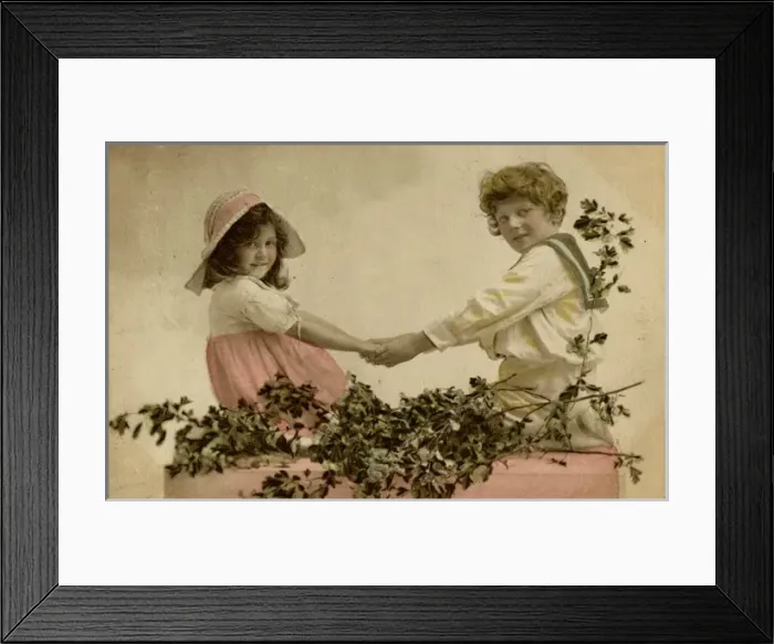 Framed Print : Little girl and boy holding hands Framed Print : Little girl and boy holding hands
