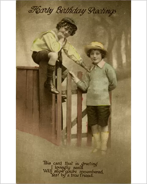 Two boys at a garden gate on a birthday postcard