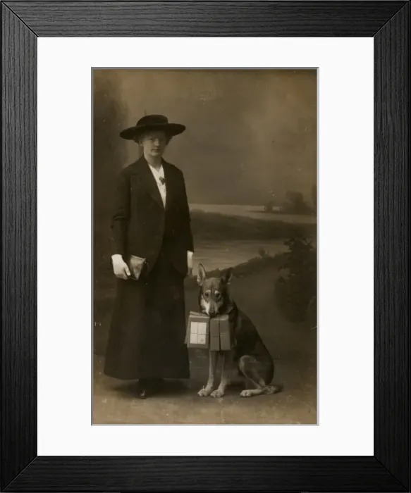 Framed Print : Woman and dog in photographers studio Framed Print : Woman and dog in photographers studio