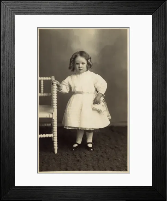 Framed Print : Young girl in pretty white dress Framed Print : Young girl in pretty white dress