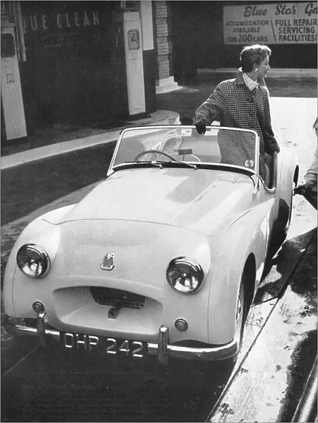 A coat by Moorcott to drive a Triumph sports car