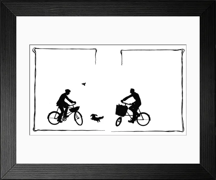 Framed Print : Koko runs between two cyclists Framed Print : Koko runs between two cyclists