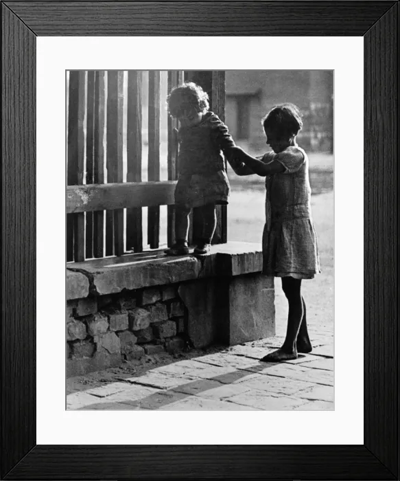 Framed Print : Playing on a Wall Framed Print : Playing on a Wall