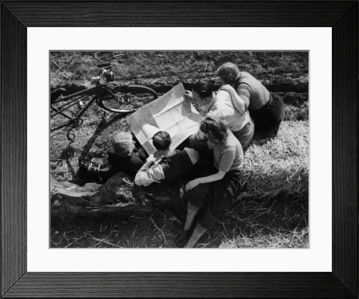 Framed Print : Studying a Cycling Map Framed Print : Studying a Cycling Map