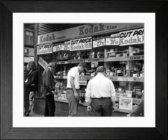 Framed Print : In Front of Camera Shop Framed Print : In Front of Camera Shop