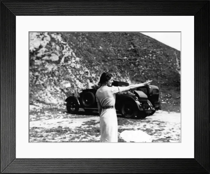 Framed Print : Woman Firing a Revolver Framed Print : Woman Firing a Revolver