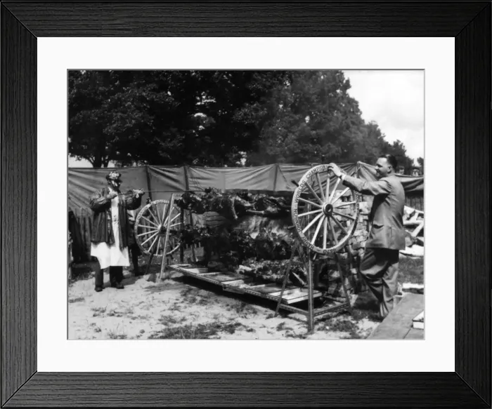 Framed Print : Roasting Deer on a Spit Framed Print : Roasting Deer on a Spit