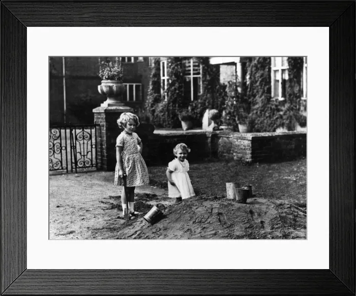 Framed Print : Princess Elizabeth and Princess Margaret digging Framed Print : Princess Elizabeth and Princess Margaret digging