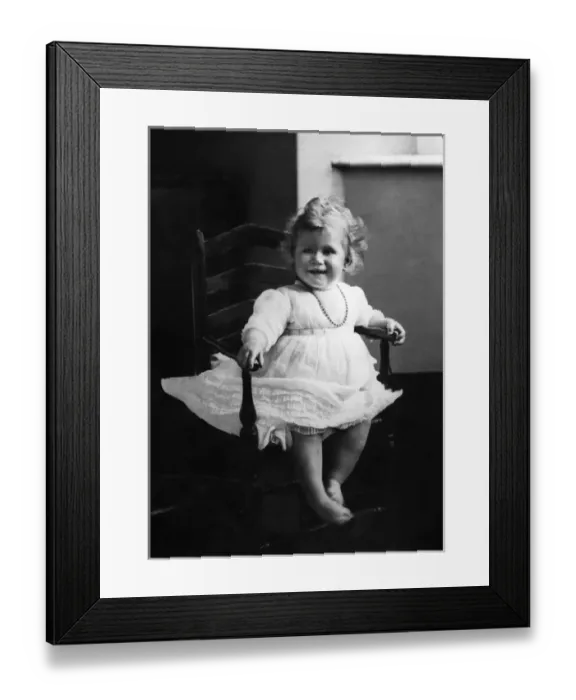 Framed Print : Princess Elizabeth of York sits in a high chair Framed Print : Princess Elizabeth of York sits in a high chair