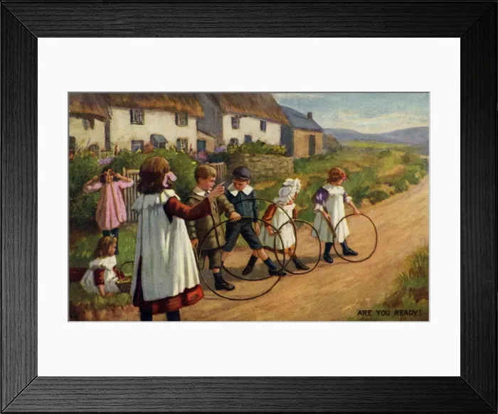 Framed Print : Hoops. Artist Anon. Children playing hoops on a country road Date: 1911 Framed Print : Hoops. Artist Anon. Children playing hoops on a country road Date: 1911