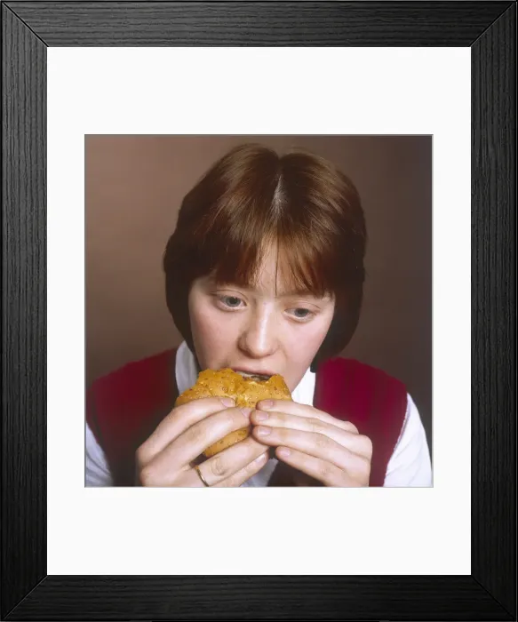 Framed Print : Girl Eating a Hamburger Framed Print : Girl Eating a Hamburger