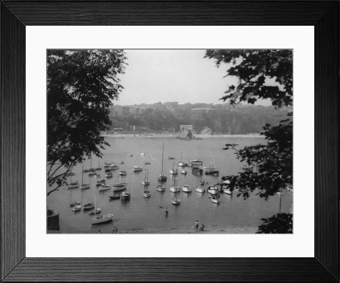 Framed Print : TENBY BAY. A quiet scene, with moored craft in the harbour at Tenby, Pembrokeshire, Wales Framed Print : TENBY BAY. A quiet scene, with moored craft in the harbour at Tenby, Pembrokeshire, Wales