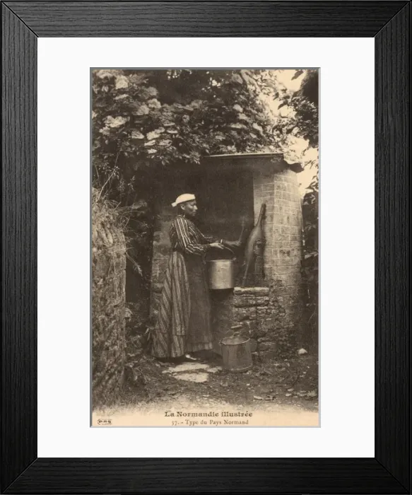 Framed Print : A woman from Normandy at the well Framed Print : A woman from Normandy at the well