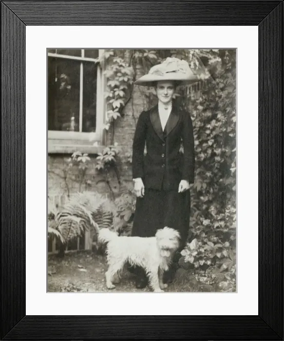 Framed Print : Young Edwardian woman with a dog Framed Print : Young Edwardian woman with a dog