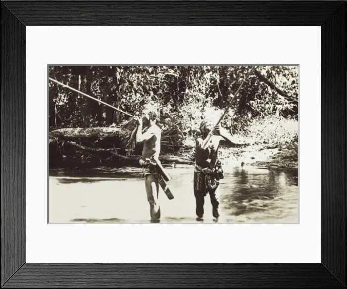 Framed Print : Malaysia - Men from the Sohail Tribe using blow pipes Framed Print : Malaysia - Men from the Sohail Tribe using blow pipes