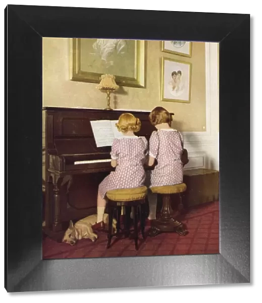 A Royal Duet - Princess Elizabeth and Margaret at the piano