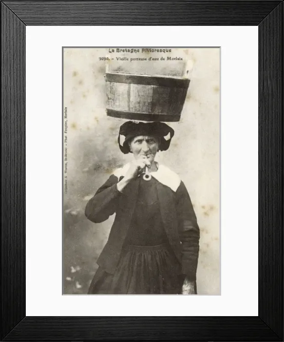 Framed Print : Old French Water Carrier smoking a pipe Framed Print : Old French Water Carrier smoking a pipe