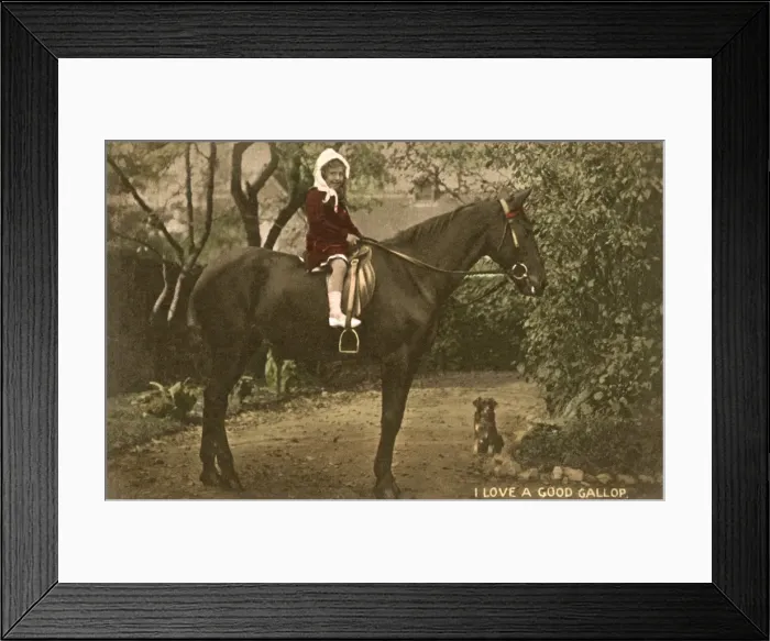 Framed Print : Little girl astride a large horse Framed Print : Little girl astride a large horse
