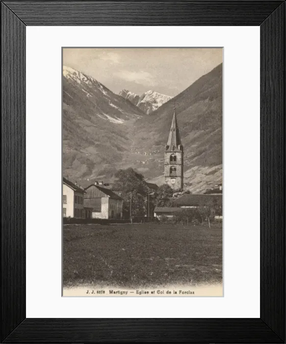 Framed Print : Martigny - Church and Mountain Pass of Forclaz Framed Print : Martigny - Church and Mountain Pass of Forclaz