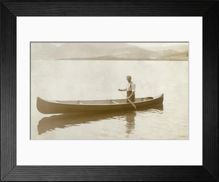 Framed Print : Newfoundland and Labrador - Man paddling a canoe Framed Print : Newfoundland and Labrador - Man paddling a canoe