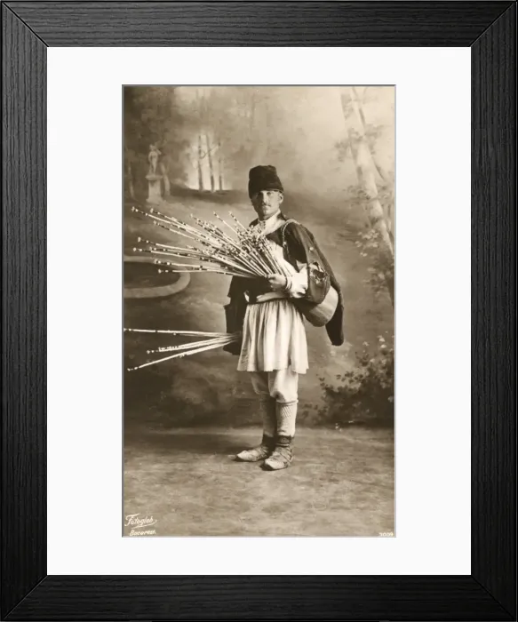 Framed Print : Romanian man with bunch of thin sticks Framed Print : Romanian man with bunch of thin sticks